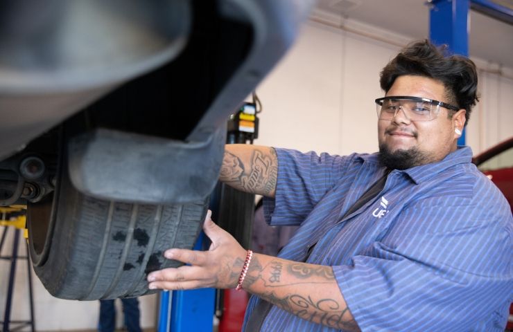 automotive technician working on car