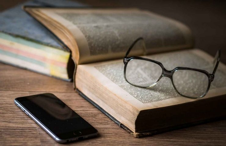 Six Work-Life Balance Tips for Adult Learners - UEI College book and glasses