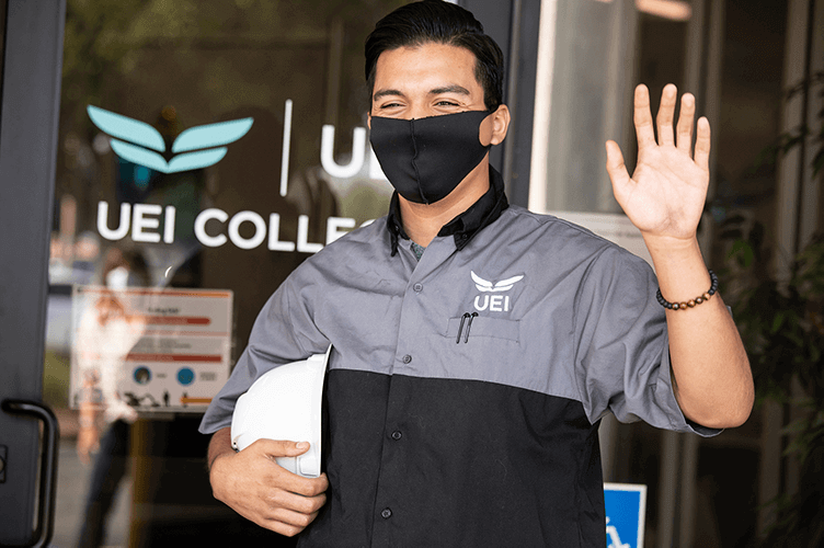 UEI Responds to COVID-19 with Resilience and Determination - UEI College UEI college male student