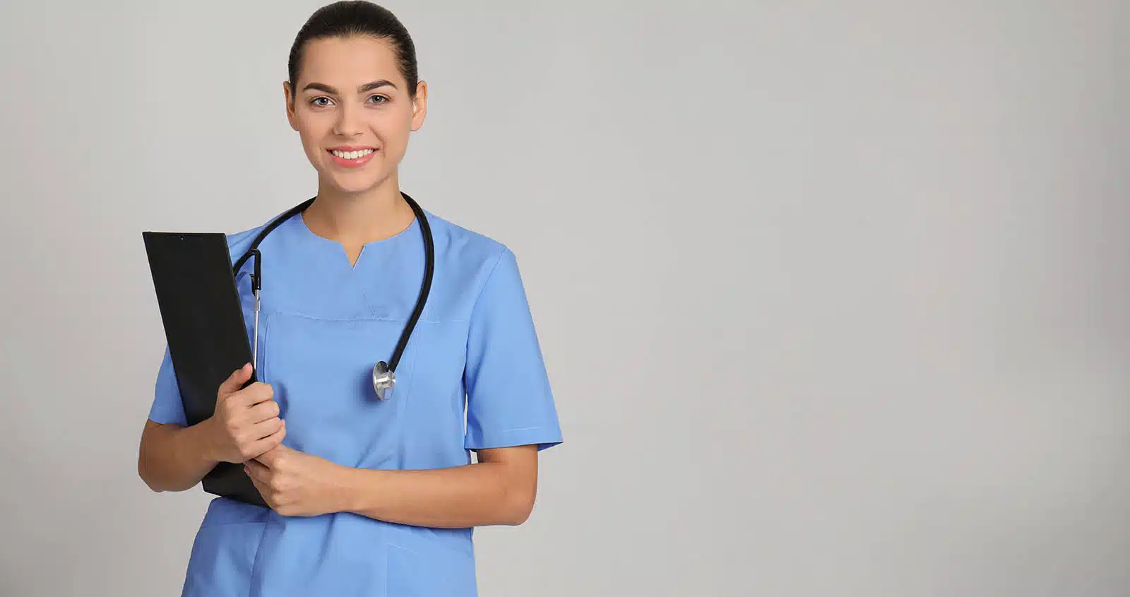 female-medical-assistant-holding-file