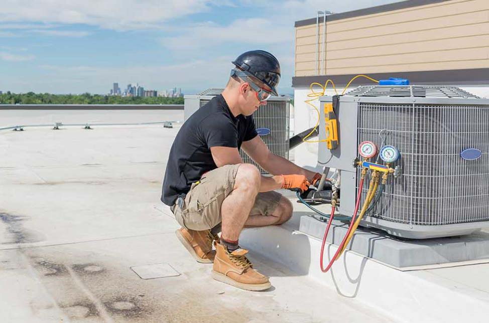 hvac-tech-working-on-ac