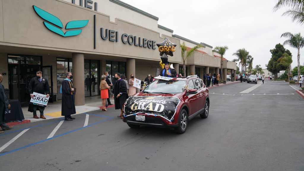 UEI College in Chula Vista hosts drive through graduation ceremony